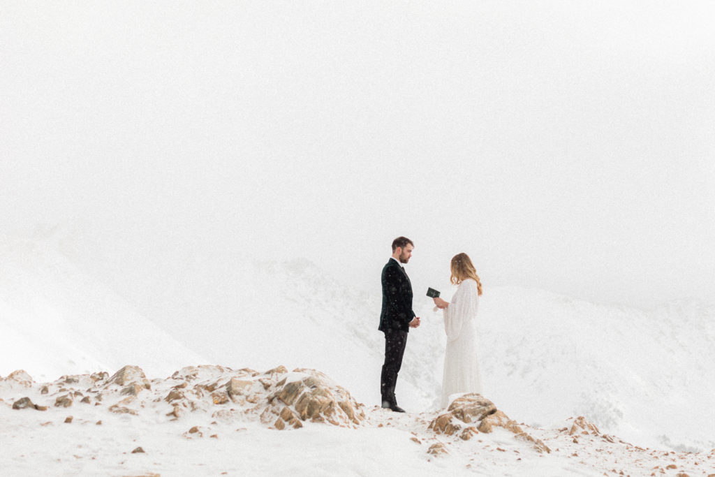 couple had first look in the winter at Loveland Pass in Colorado on a mountaintop while it’s snowing