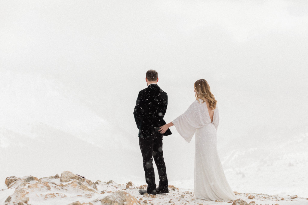 couple had first look in the winter at Loveland Pass in Colorado on a mountaintop while it’s snowing