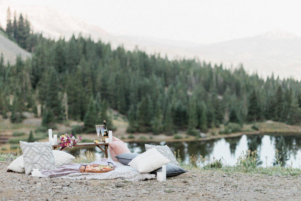 Illinois couple eloped in Telluride, Colorado with a morning brunch picnic with anthropologie champagne lustered flute figs bacon flowers by sugar and stems iva grace at Gold King Basin near Alta Lakes for stunning sunrise elopement with Diana Coulter