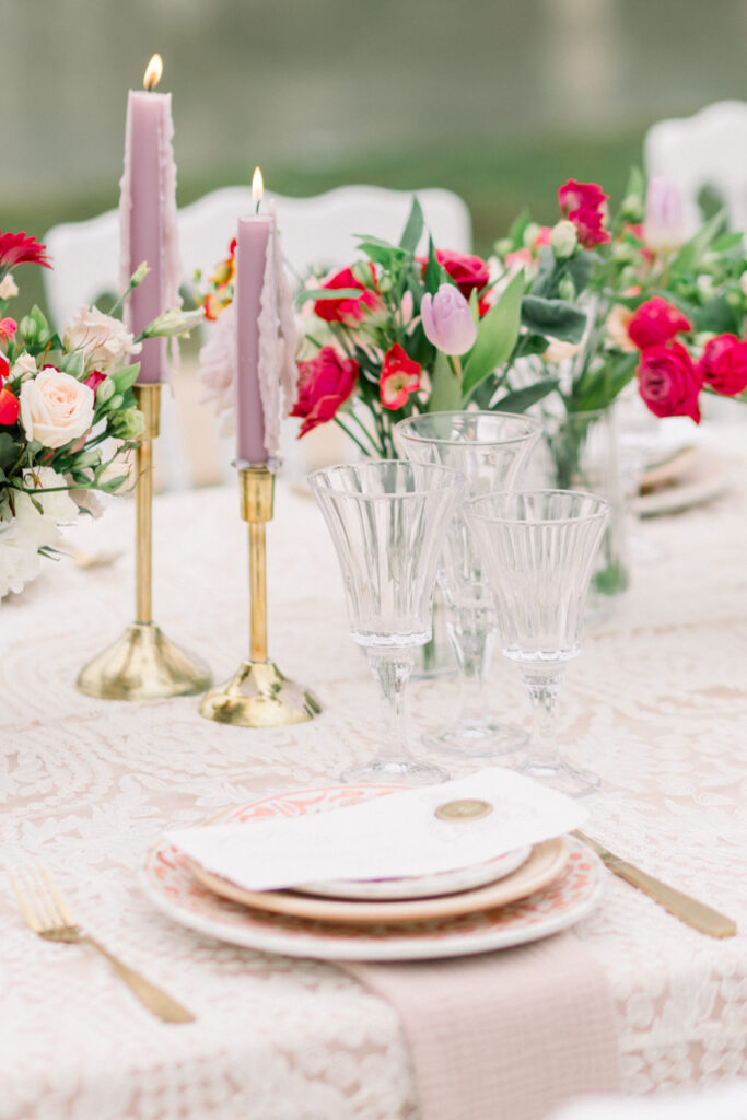 hand painted moroccan plates, berry colored florals and delicate lace was the focal point for this luxury tablescape